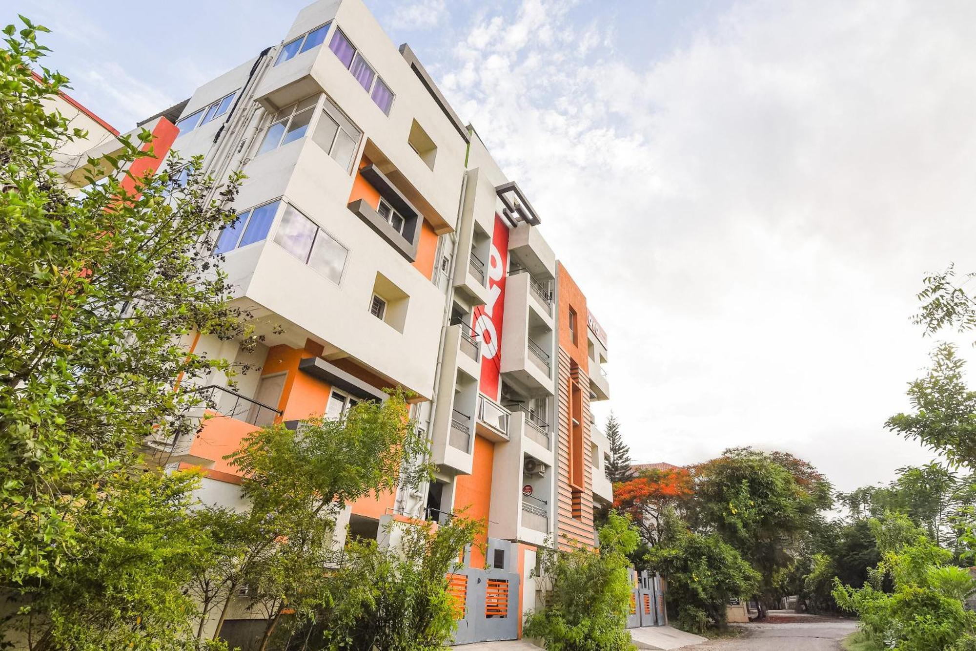Oyo Flagship Lotus Lakeview Apartments Singānallūr Buitenkant foto