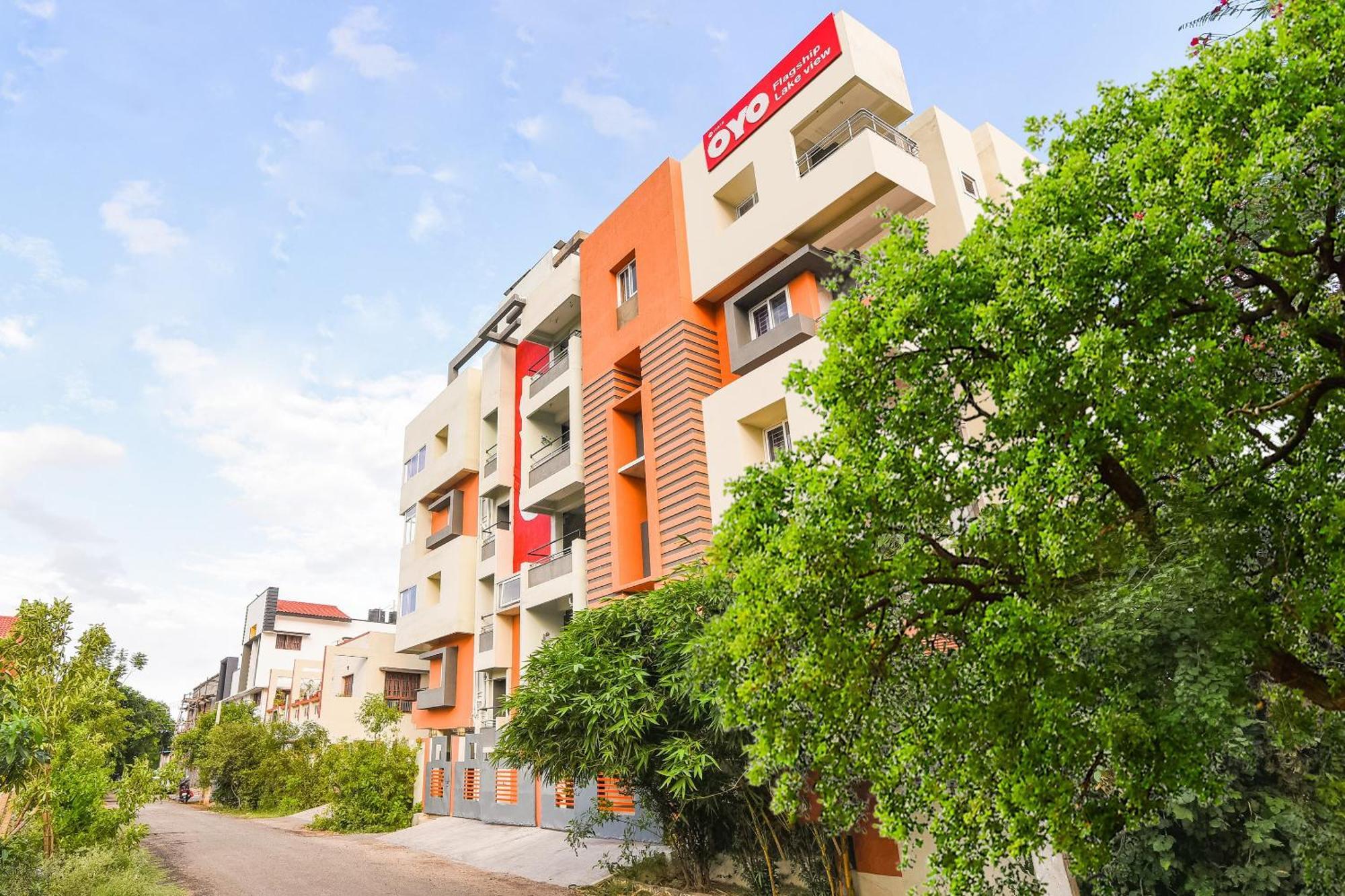 Oyo Flagship Lotus Lakeview Apartments Singānallūr Buitenkant foto